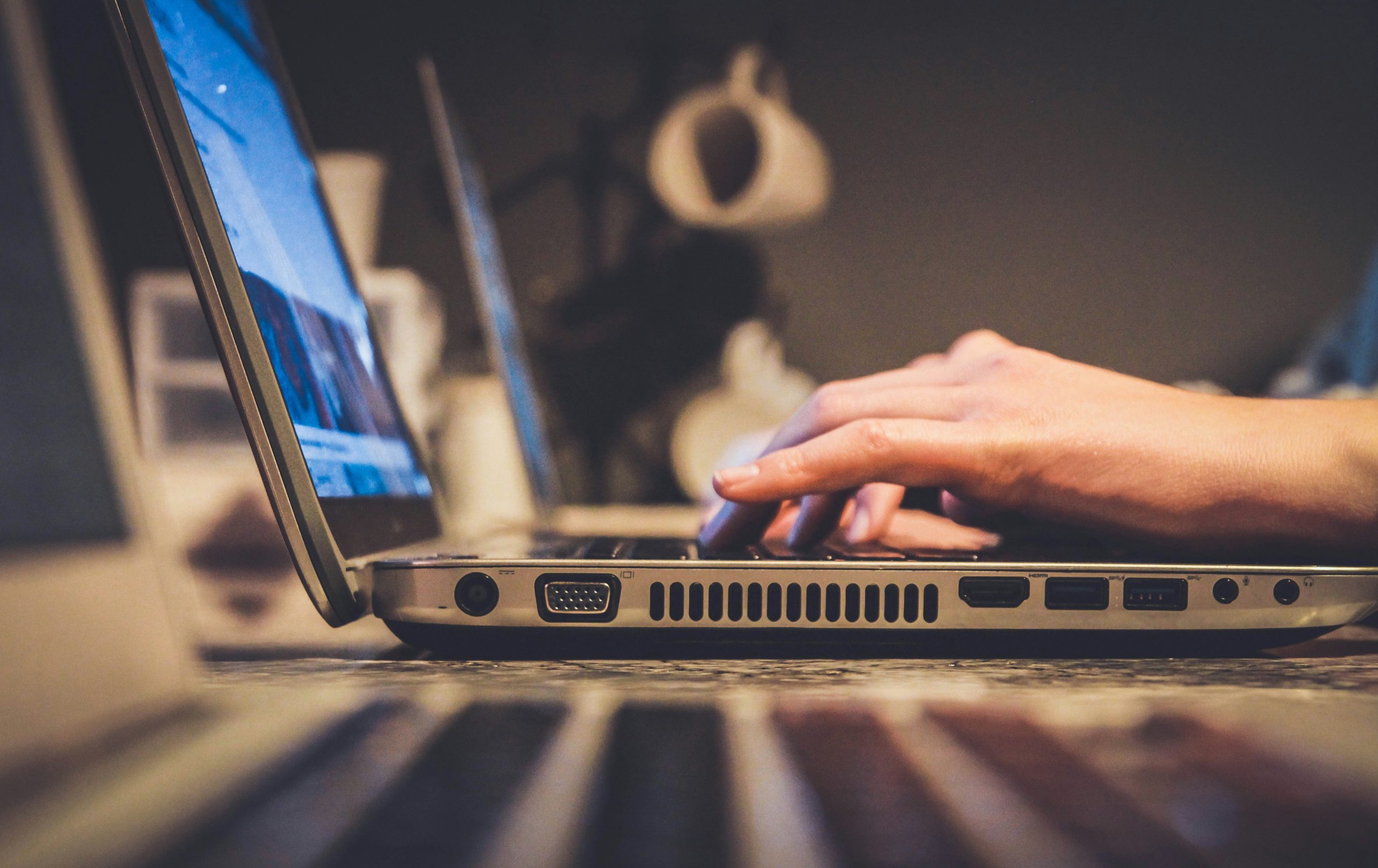 Typing on laptop - ServMe IT